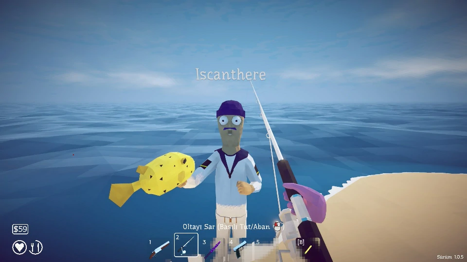 A teammate holding up a huge pufferfish catch at the shoreline